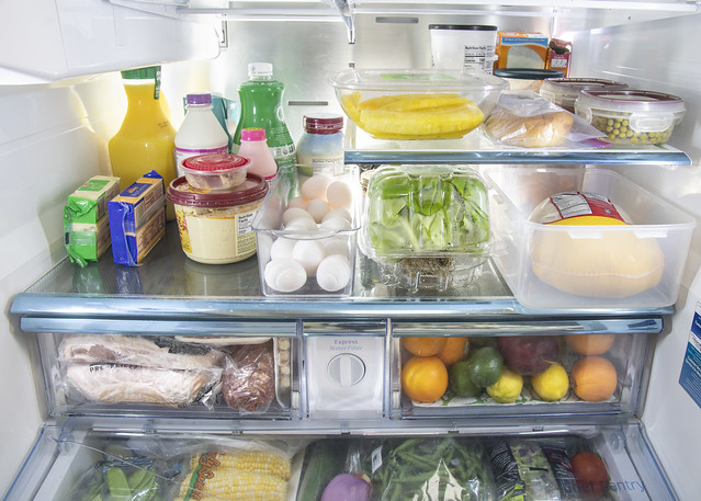 fridge loaded with the food in disposable packaging